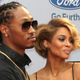 A photo of Ciara with Future thinking “She’s a flop”